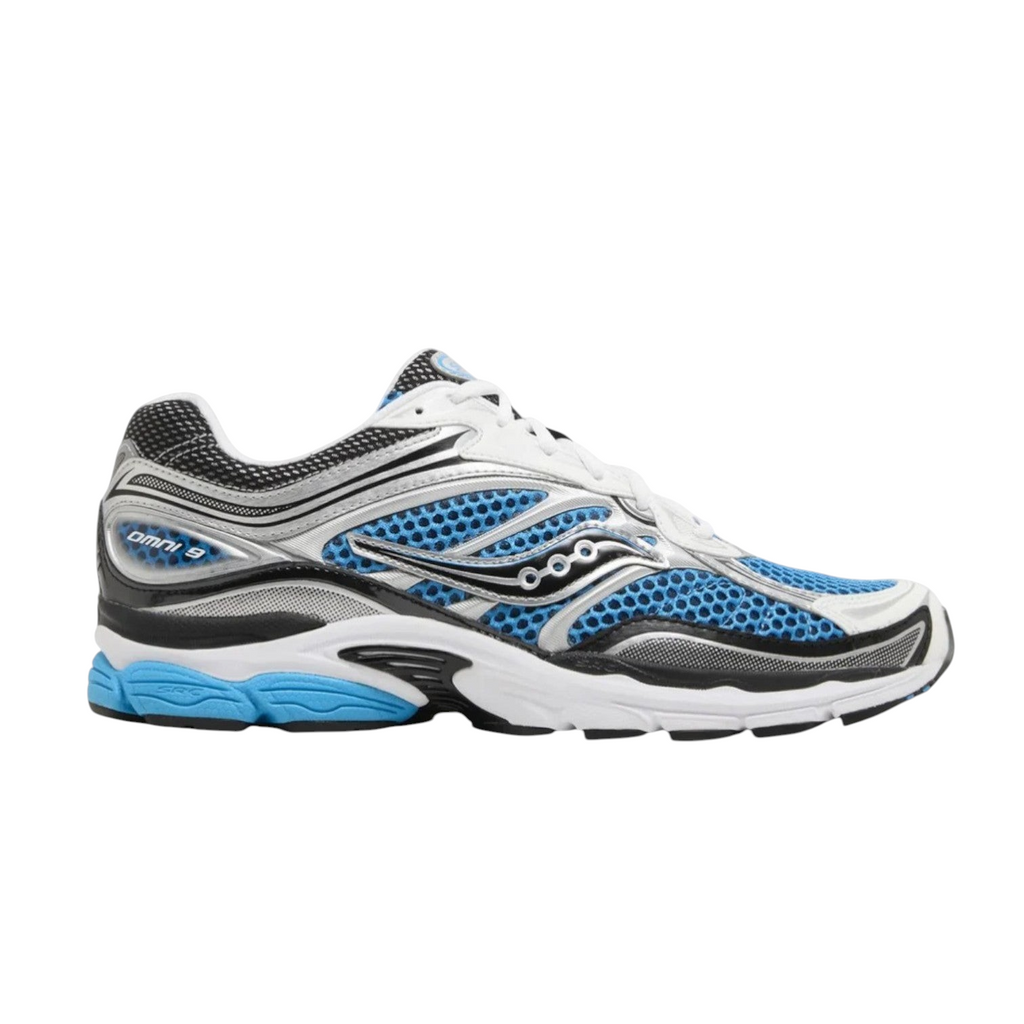 JeevzPlug Saucony Progrid Omni 9 Royal Silver sneaker with blue mesh, silver overlays, and cushioned rubber sole.