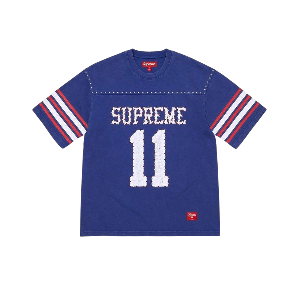 JeevzPlug Supreme blue short sleeve football jersey with white number 11, studded chest detail, and striped sleeves.