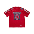 JeevzPlug red Supreme Bones football jersey featuring white bone graphics on sleeves and number 63 print on front