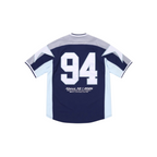 Back view of the JeevzPlug Supreme Stars Baseball Jersey in navy with white number 94 and star graphic details.