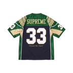 JeevzPlug Supreme Wings football jersey in navy and green poly mesh with number 33 and angel wing graphic details.