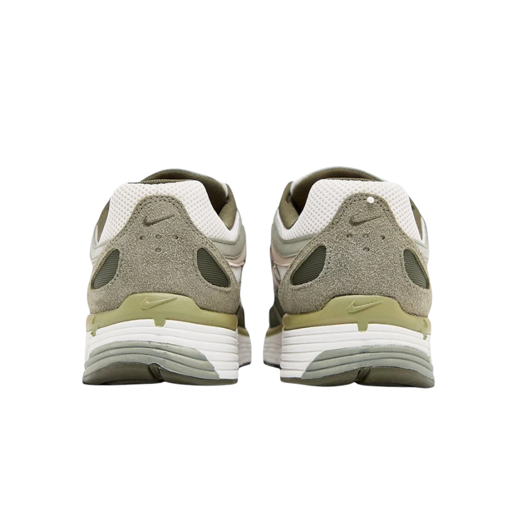 JeevzPlug Nike P-6000 Cargo Khaki sneakers, rear view showing olive green mesh, suede overlays, and white foam midsole.