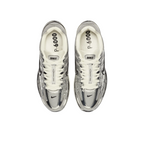 JeevzPlug Nike P-6000 Metallic Silver sneakers featuring chrome synthetic leather overlays and white laces, top view.