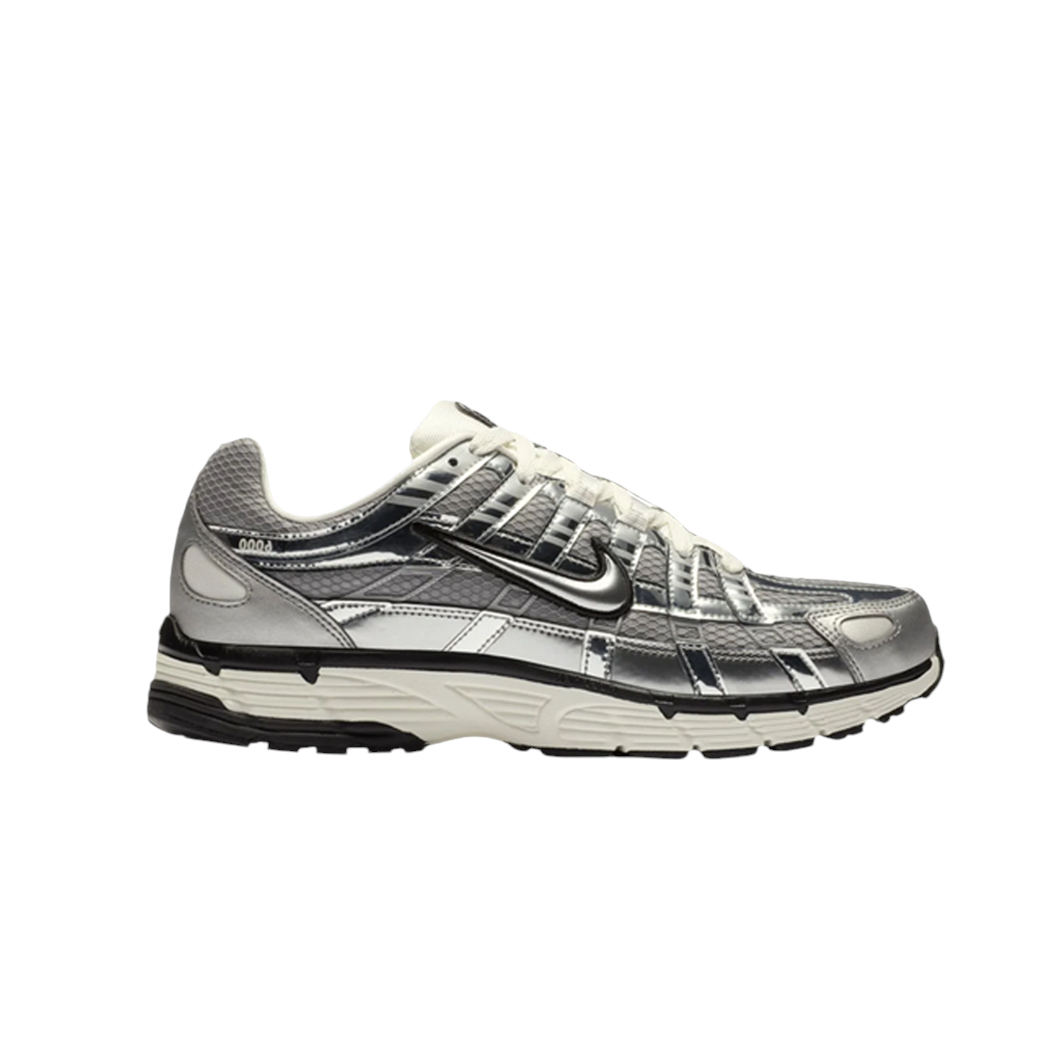 JeevzPlug Nike P-6000 sneaker in metallic silver and chrome with black accents and a white foam midsole