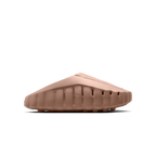 JeevzPlug Nike Mind 001 Slide in Sand Drift hemp colour with a molded upper, side perforations, and textured outsole.