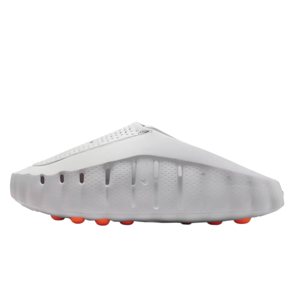 JeevzPlug Nike Mind 001 Slide in Light Smoke Grey with a sculpted one-piece upper and orange outsole detailing.