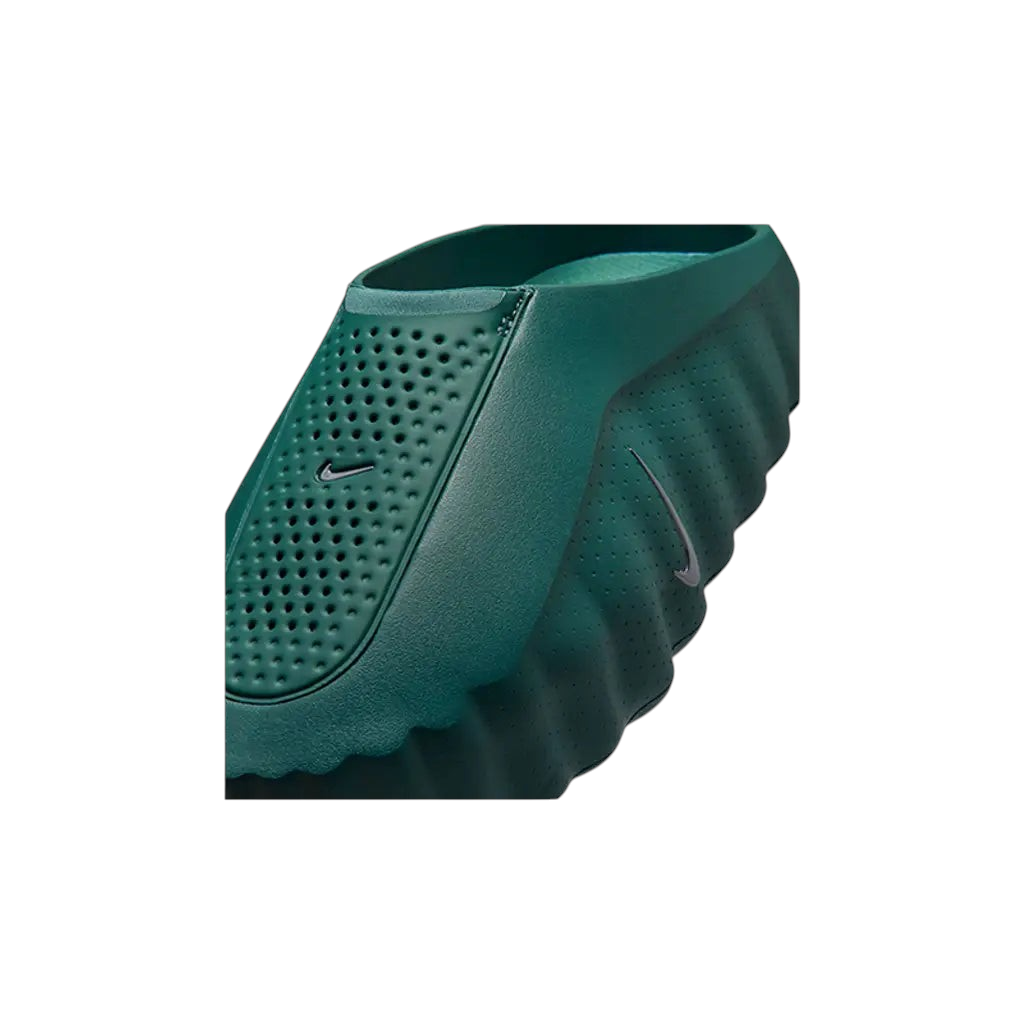 JeevzPlug Nike Mind 001 Slide in Mineral Slate green with a perforated upper and contoured foam design.