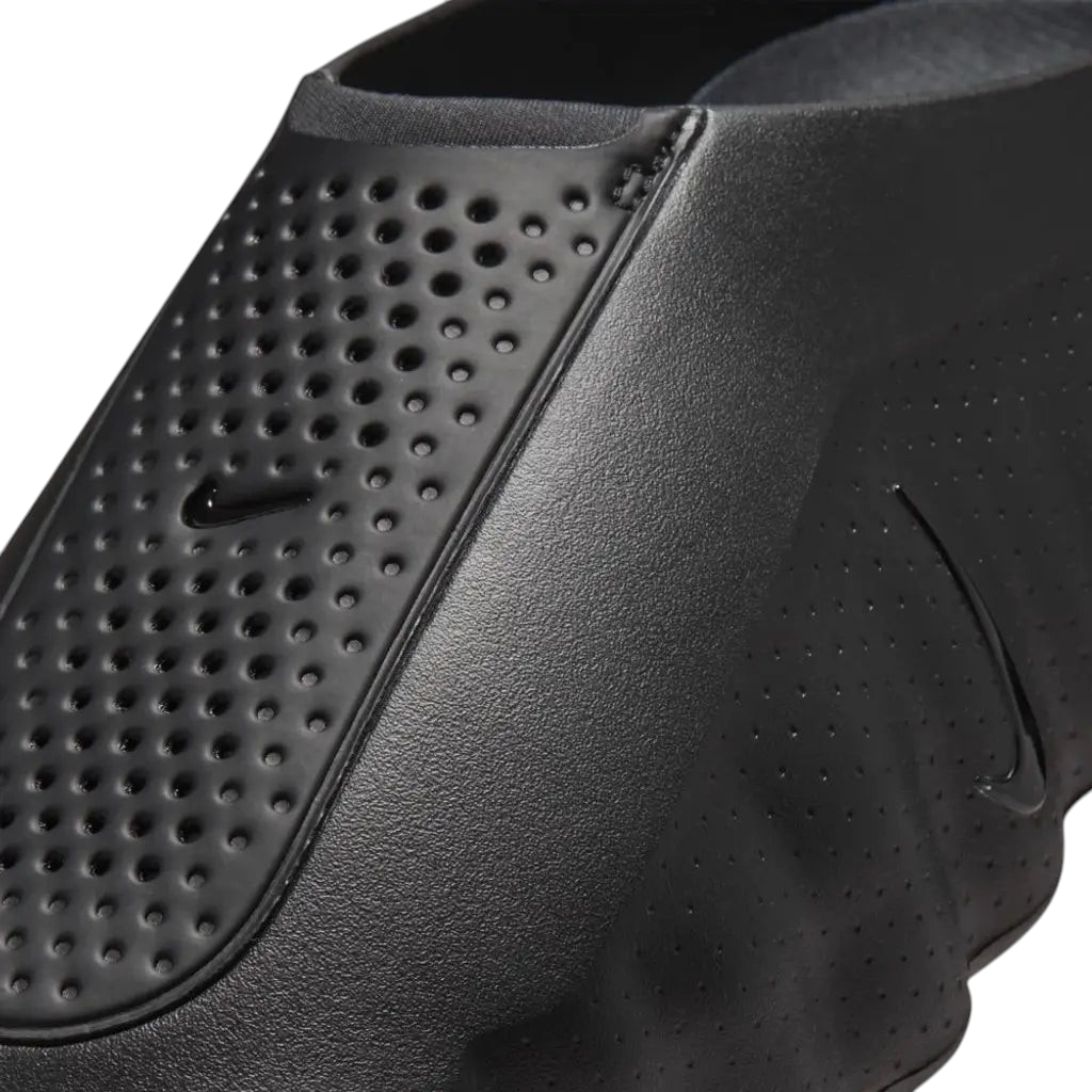 JeevzPlug Nike Mind 001 Slide in triple black featuring a molded upper with perforated detailing and a tonal swoosh.