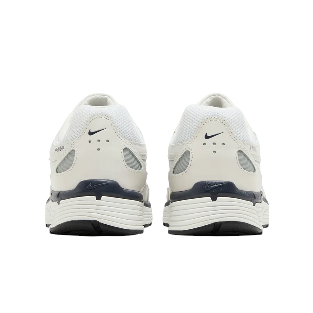 JeevzPlug Nike P-6000 Obsidian Summit White sneakers showing the rear view with white mesh and dark blue accents