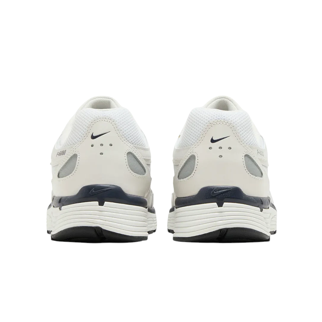 JeevzPlug Nike P-6000 Obsidian Summit White sneakers showing the rear view with white mesh and dark blue accents