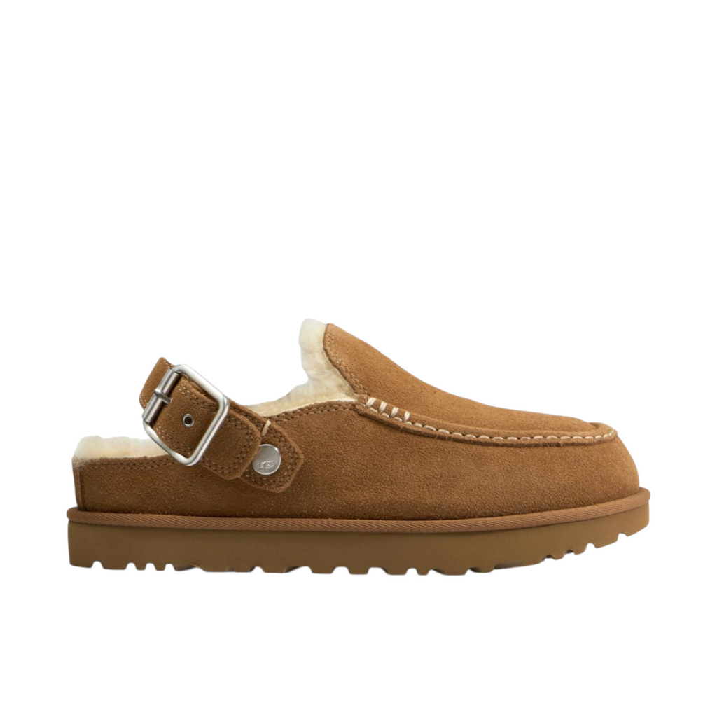JeevzPlug UGG Goldenstar Evelina clog in chestnut brown suede with a plush sheepskin lining and adjustable buckle strap