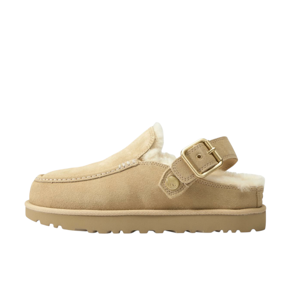 JeevzPlug UGG Goldenstar Evelina clog in sand castle beige suede with adjustable buckle strap and plush lining