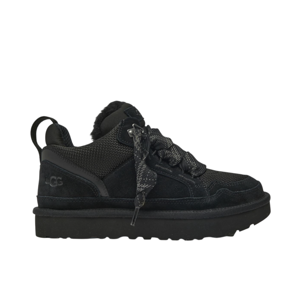 JeevzPlug UGG Lowmel Trainer in black featuring a chunky sole, suede and mesh upper, and thick patterned laces.