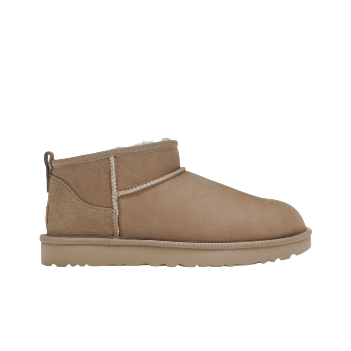 JeevzPlug UGG Ultra Mini boot in sand suede with a low-cut ankle and plush sheepskin lining