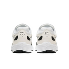JeevzPlug Nike P-6000 Sail Wolf Grey sneakers showing the white heel counters with black Swoosh logos and perforations