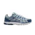 JeevzPlug Nike P-6000 Worn Blue Denim sneakers featuring a blue denim upper with suede overlays and cream accents.